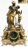 Часы каминные Мать с ребёнком. Шпиатр, литьё, прочеканка, патинировани